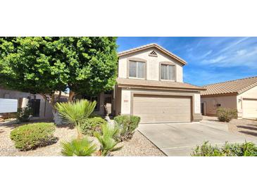 Charming two-story home featuring a two car garage, neutral color palette, and well-maintained landscaping at 846 W Straford Ave, Gilbert, AZ 85233
