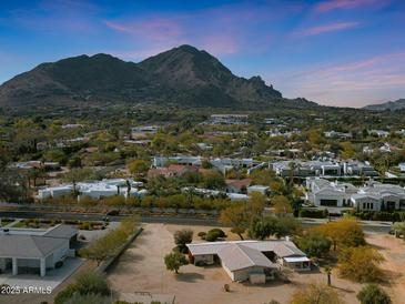 Expansive desert property with mountain views and mature landscaping in a desirable community at 5539 N 68Th Pl, Paradise Valley, AZ 85253