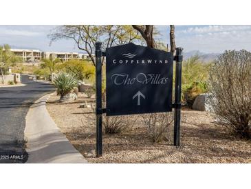 Copperwynd Villas community sign and entrance with desert landscaping and views of the mountains at 14850 E Grandview Dr # 233, Fountain Hills, AZ 85268