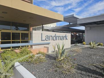 Well-manicured Landmark entrance featuring native desert landscaping and a clean, modern design at 4750 N Central Ave # D4, Phoenix, AZ 85012