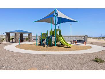 Community playground with covered picnic area, slide, and climbing structure for Gathering fun at 4324 W Jeanette Ln, San Tan Valley, AZ 85144