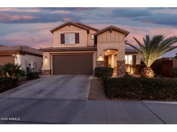 Charming two-story home with a two-car garage and desert landscaping at 5539 S Verde --, Mesa, AZ 85212