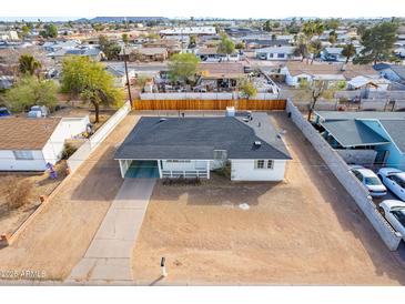 Well-maintained single-story home with a front yard and long driveway at 1137 E Mcmurray Blvd, Casa Grande, AZ 85122