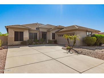 Charming single-story home featuring a tile roof and desert landscaping at 6887 S Teresa Dr, Chandler, AZ 85249
