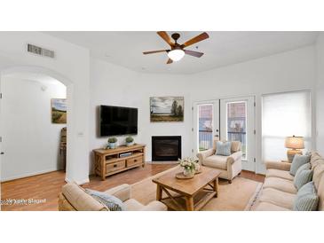 Cozy living room with fireplace, TV, and comfortable seating perfect for relaxing and entertaining at 4533 N 22Nd St # 228, Phoenix, AZ 85016