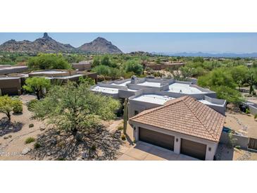 Stunning desert home with a three-car garage and mountain views at 9781 E Gamble Ln, Scottsdale, AZ 85262