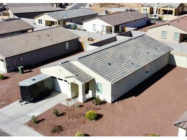 Charming single-story home with desert landscaping and a private driveway at 1418 E Peggy Dr, Casa Grande, AZ 85122