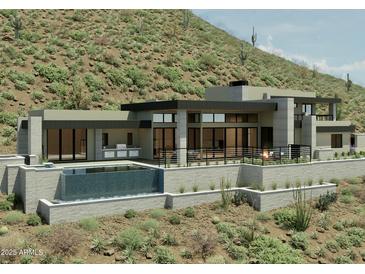 Stunning modern home with desert landscaping, pool, outdoor kitchen and open-air terraces on a hillside setting at 39347 N Old Stage Rd, Cave Creek, AZ 85331