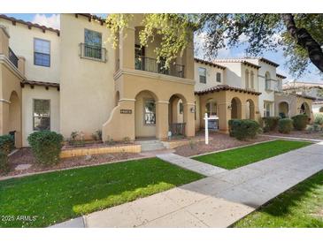 Charming two-story home features a cozy balcony and well-manicured landscaping in a desirable community at 21141 W Main St, Buckeye, AZ 85396