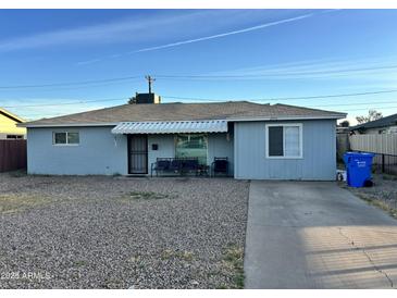 Charming single-story home featuring a stone yard, covered entrance, and a well-maintained exterior in a peaceful neighborhood at 2915 W Montecito Ave, Phoenix, AZ 85017