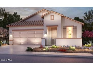 Charming single-story home with a two-car garage and desert landscaping, perfect for curb appeal at 41905 W Hospitality Ln, Maricopa, AZ 85138