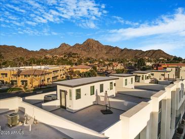 Stunning rooftop view showcasing modern architecture and distant mountain vistas at 1717 E Morten Ave # 2, Phoenix, AZ 85020