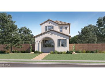 Charming two-story home featuring a stucco exterior, arched entryway, desert landscaping and a tiled roof at 2938 N 98Th Ln, Phoenix, AZ 85037