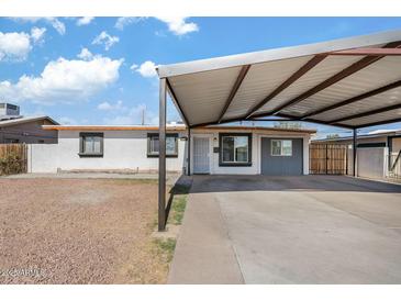 Charming single-story home with covered parking and neutral color scheme, located in a desirable neighborhood at 2812 W Heatherbrae Dr, Phoenix, AZ 85017