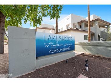 Lakeshore at Andersen Springs Condominiums sign with building views and blue sky at 1825 W Ray Rd # 1148, Chandler, AZ 85224