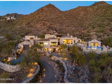 Stunning estate nestled in the mountains offering luxurious living and breathtaking views at 11268 E Moonlight Cyn, Scottsdale, AZ 85255