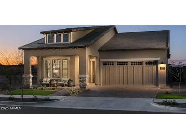 Charming single-story home with a tile roof, brick accents and a covered front porch at 2038 W Union Park Dr, Phoenix, AZ 85085