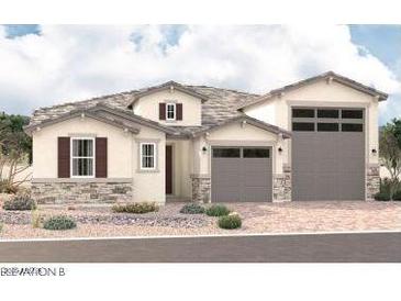 Charming single-story home features a two-car garage and stone accents at 25350 N 158Th Ct, Surprise, AZ 85387