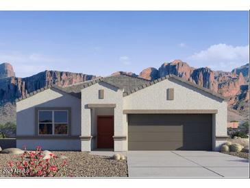 Charming single-story home with neutral stucco, 2-car garage, and a mountain view at 28228 N Nealite Dr, San Tan Valley, AZ 85143