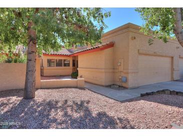 Charming single-story home featuring a two-car garage and a well-maintained front yard at 4843 W Del Rio St, Chandler, AZ 85226