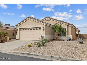 Charming single-story home showcasing a well-maintained front yard with desert landscaping at 24108 N Nectar Ave, Florence, AZ 85132