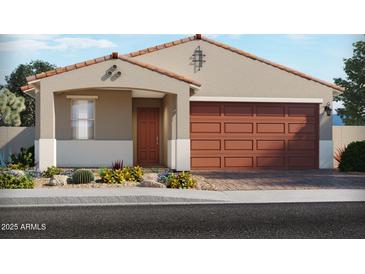 Charming single-story home showcasing a two-car garage, a covered entryway, and complemented by desert landscaping at 116 N 176Th Ln, Goodyear, AZ 85338