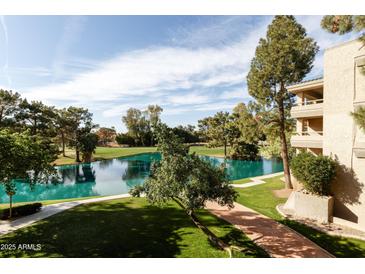 Beautiful pond view in a lush green setting with trees at 5124 N 31St Pl # 536, Phoenix, AZ 85016