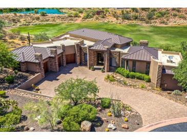 Overhead shot of the home featuring desert landscaping and a paved driveway at 10224 N Azure Vista Trl, Fountain Hills, AZ 85268