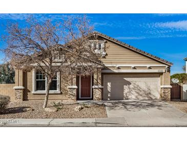 Charming single-Gathering home featuring a two-car garage and well-maintained landscaping at 17192 W Post Dr, Surprise, AZ 85388