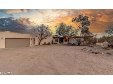 Charming single-story home with desert landscaping and a two-car garage at 2107 N Campo Allegre Dr, Tempe, AZ 85288