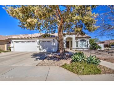 Charming single-story home featuring a well-maintained yard and attached two-car garage at 792 W Nolan Way, Chandler, AZ 85248