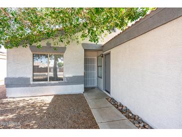 Inviting front entrance with a security door and desert landscaping at 1793 S Valley Dr, Apache Junction, AZ 85120