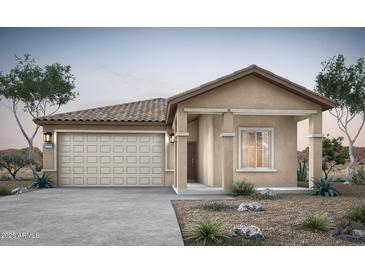Charming single-story home with a two-car garage, desert landscaping, and a covered entryway at 16495 N Comet Trl, Maricopa, AZ 85138