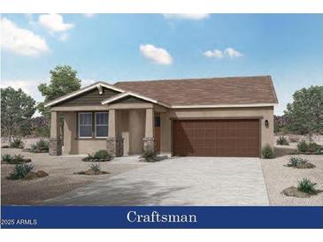 Charming single-story home featuring desert landscaping and a welcoming covered entryway at 4424 S 127Th Ave, Avondale, AZ 85323