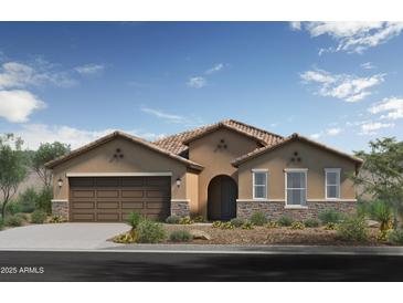 Charming single-story home featuring a two-car garage, stone accents and a tile roof at 17131 W Oberlin Way, Surprise, AZ 85387