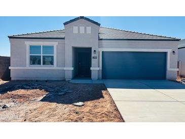 Charming single-story home with neutral stucco, a gray roof, a spacious garage, and desert landscaping at 28200 N Nealite Dr, San Tan Valley, AZ 85143