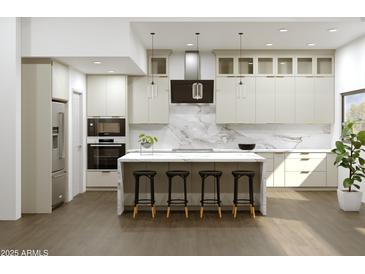 Bright kitchen with stainless steel appliances, a large island, marble backsplash, and modern lighting at 8313 E Thoroughbred Trl, Scottsdale, AZ 85258