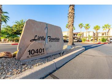 Community sign displaying 'Little Fountain Resort Condominiums' and the address at 10401 N Saguaro Blvd # 104, Fountain Hills, AZ 85268