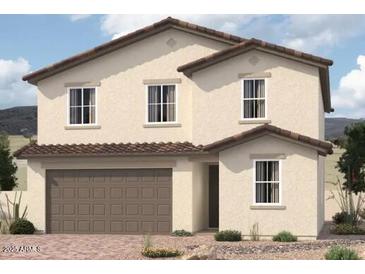 Charming two-story home with neutral stucco, tiled roof, manicured landscaping, and a two-car garage at 11627 W Beck Ave, Youngtown, AZ 85363