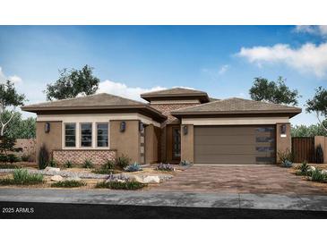 Charming single-story home featuring a modern design, a two-car garage and professionally landscaped yard at 1416 E Cherrywood Pl, Chandler, AZ 85249