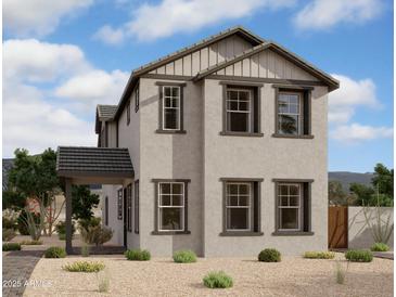 Charming two-story home featuring a neutral color palette, well-maintained landscaping, and a covered entry at 26217 N 19Th Ln, Phoenix, AZ 85085