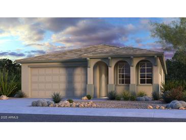 Charming single-story home featuring a two-car garage, covered entry and desert landscaping at 8819 W Pasadena Ave, Glendale, AZ 85305
