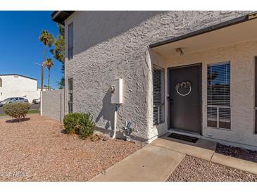 Close-up view of a home entrance with a decorative wreath and a 'Welcome' mat at 1051 S Dobson Rd # 137, Mesa, AZ 85202