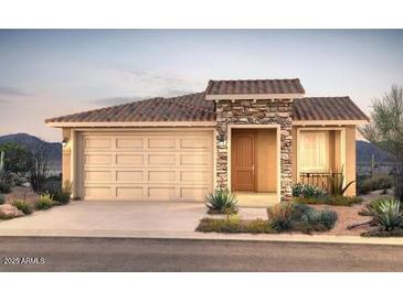 Charming single-story home featuring a stone facade, tile roof, and well-manicured landscaping at 13582 W Calle De Pompas --, Peoria, AZ 85383