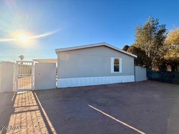 Charming single-story home featuring a well-maintained yard and a classic design at 538 S 98Th St, Mesa, AZ 85208