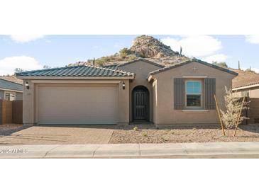 Charming single Gathering home with a two car garage and desert landscaping at 13538 W Calle De Baca --, Peoria, AZ 85383