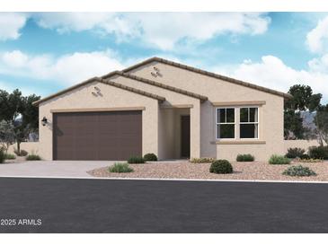 Charming single-story home featuring a two-car garage, neutral stucco, and well-maintained landscaping at 15768 W Beryl Ave, Waddell, AZ 85355