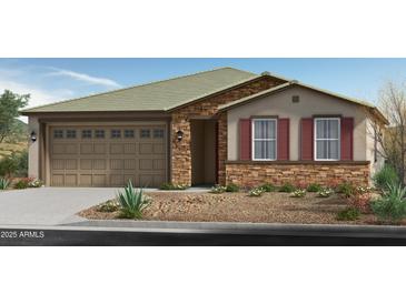 Charming single-story home featuring a stone facade, a two-car garage, and a well-manicured front yard at 2966 E Bellerive Dr, Gilbert, AZ 85298