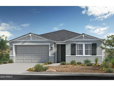 Charming single-story home with a two-car garage, neutral paint and a well-maintained landscaped yard at 2974 E Bellerive Dr, Gilbert, AZ 85298