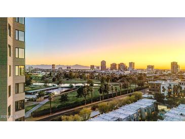 Stunning views of the city skyline and surrounding landscape from this high-rise residence at sunset at 1040 E Osborn Rd # 404, Phoenix, AZ 85014